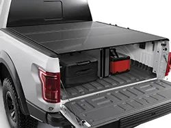 A tonneau cover fully extended on a truck bed.